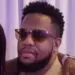 Stylish Black man portrait wearing modern sunglasses and a neatly trimmed beard