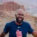 Smiling Black man in St. Louis Cardinals shirt at Grand Canyon national park